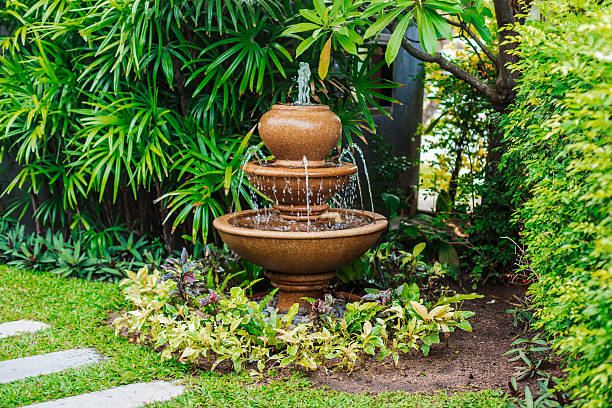 Fountain in green garden